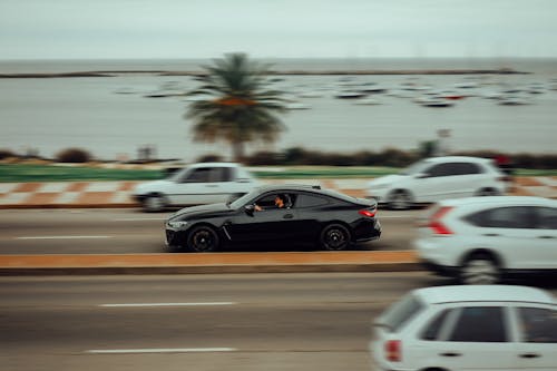 Man Driving BMW M4 on Road