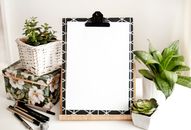 Paper On Board Beside Pens