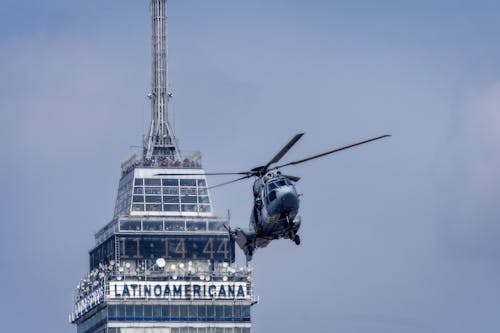Helicopter Flying over Top of Torre Latinoamericana
