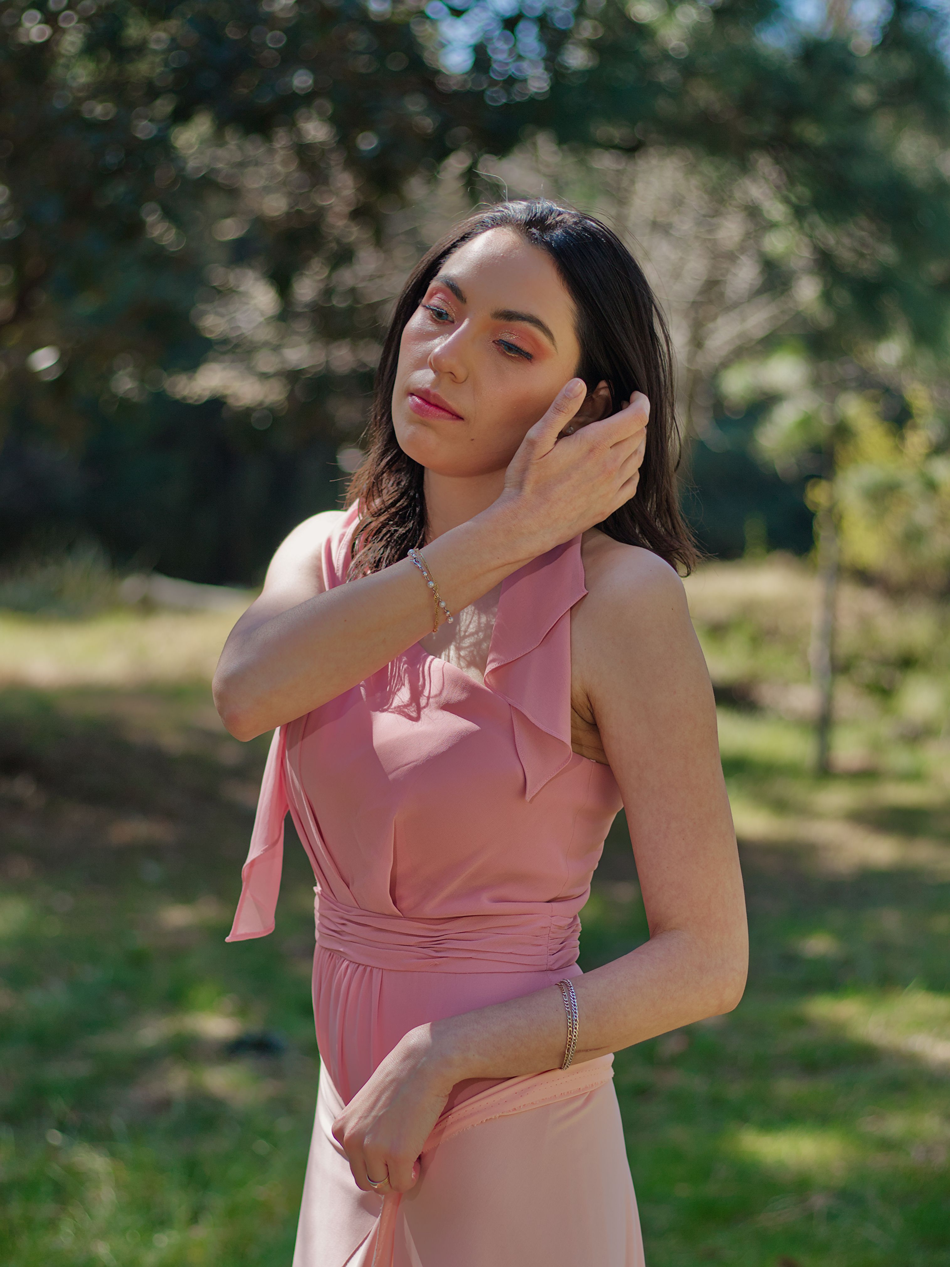 Woman Posing in a Pink Dress · Free Stock Photo