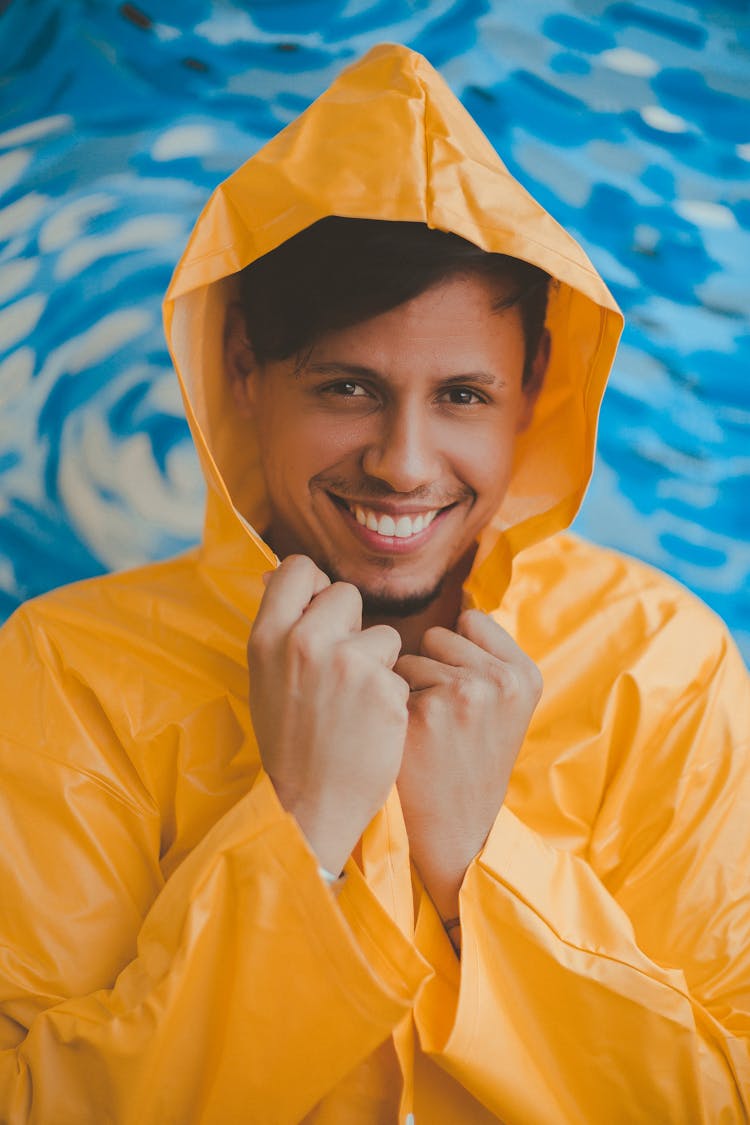 Man Wearing Yellow Raincoat