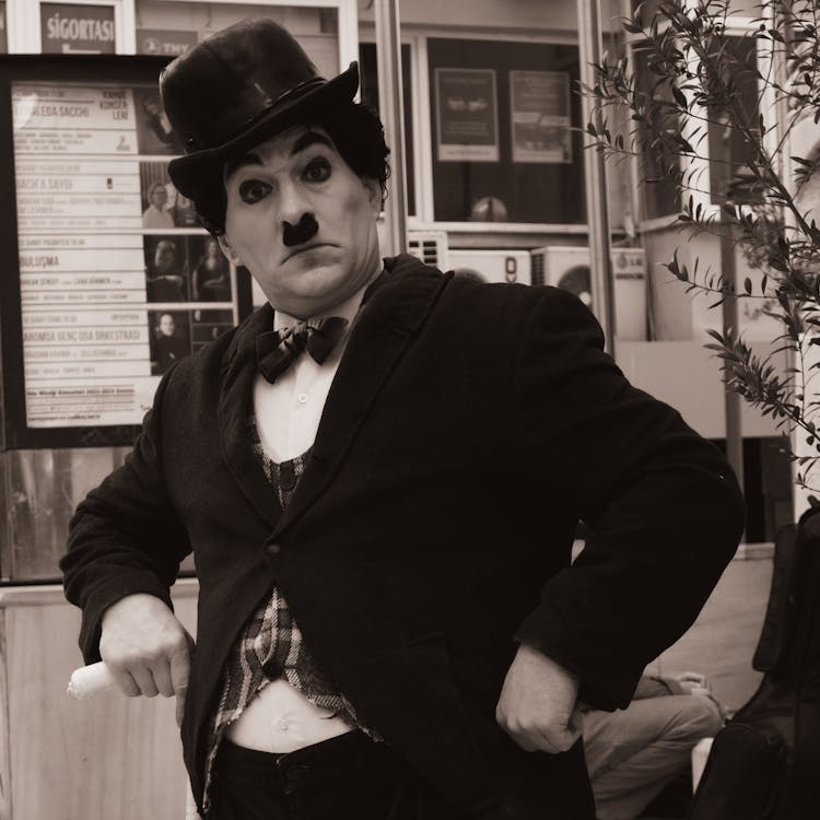 Portrait Of Man In Charlie Chaplin Costume