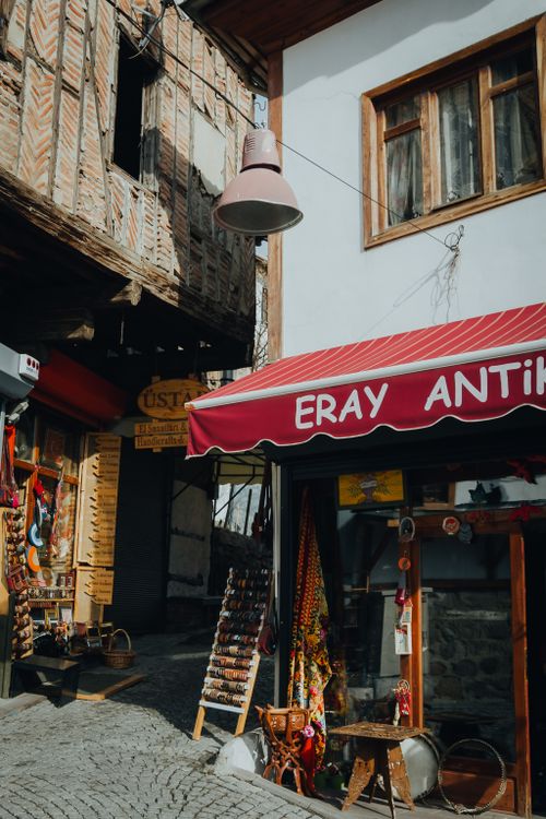 Free Explore a picturesque old town street in Turkey featuring charming shops and historic architecture. Stock Photo