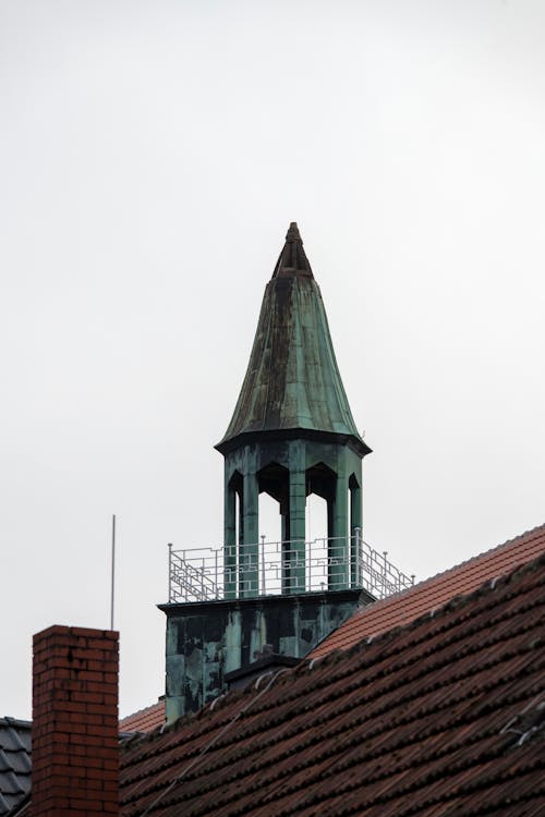 View of a Tower in a Roof of an Old Building 