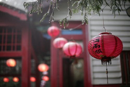 Close-up of Traditional Red Lanterns Hanging Outside 