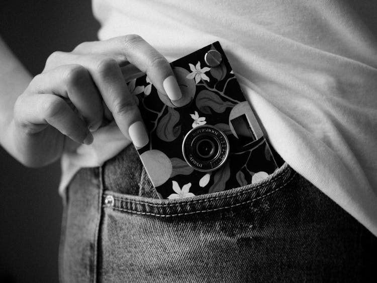 Woman Hand Holding Smartphone In Case