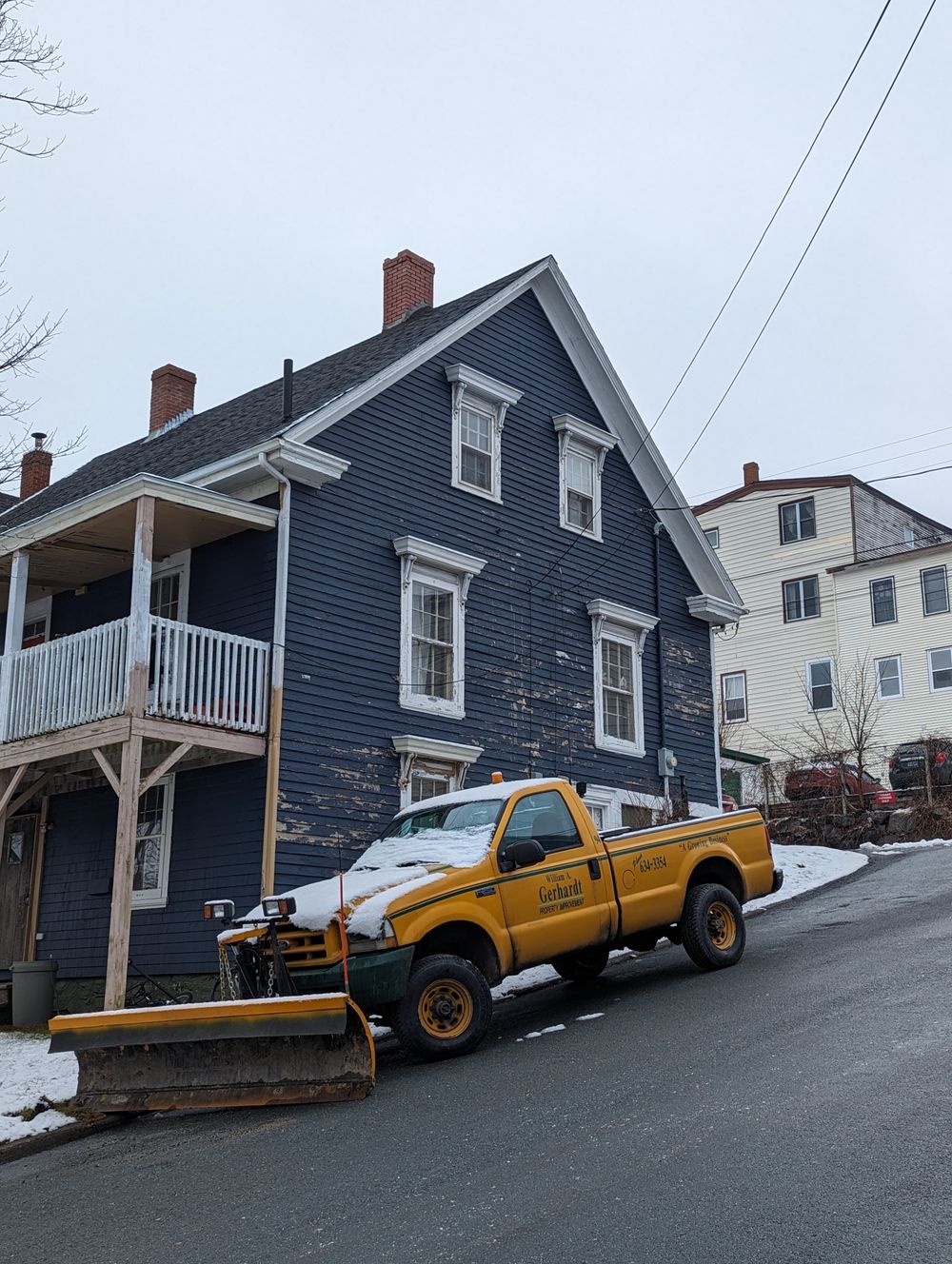 Pickup plow truck in a residential neighborhood