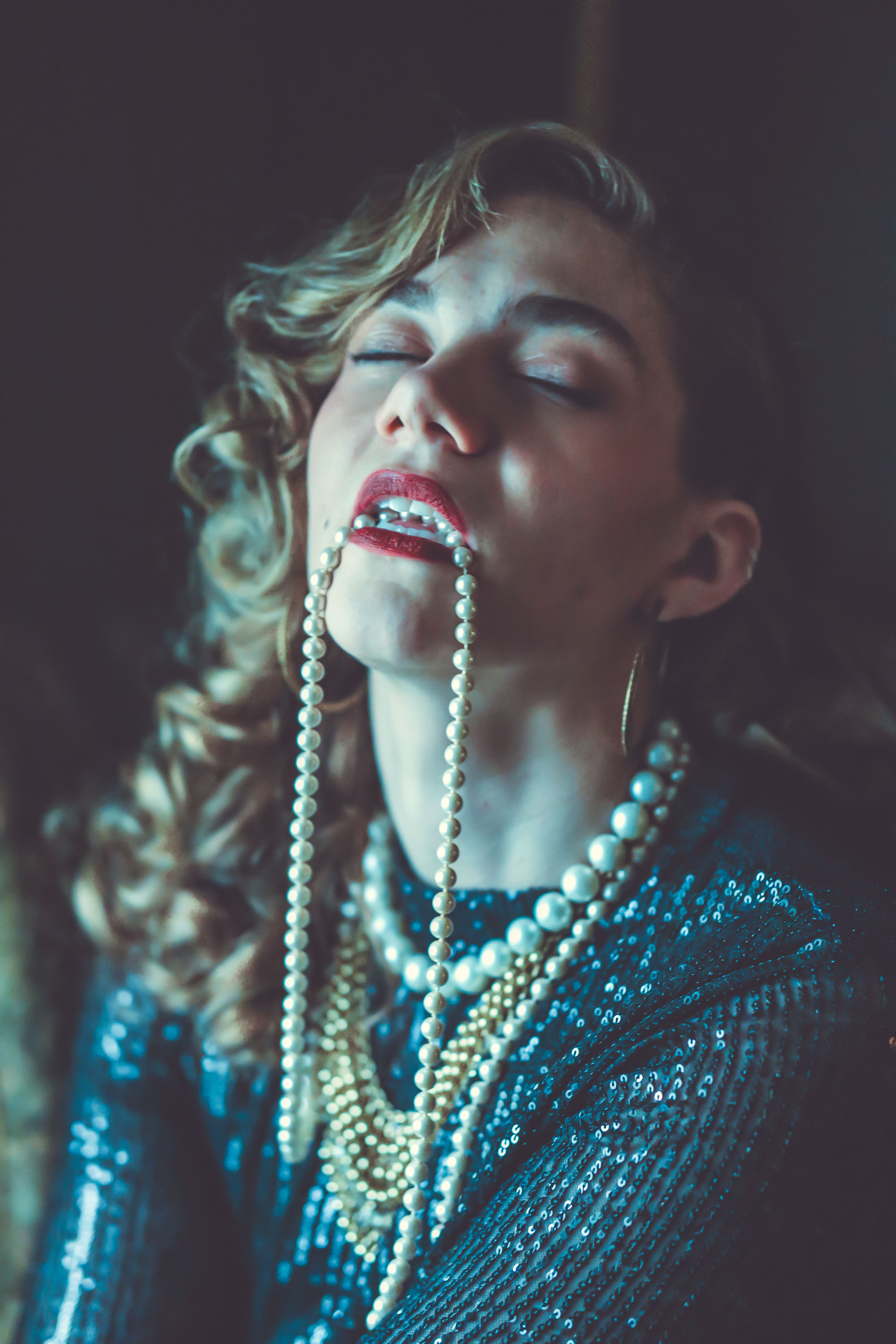 Elegant Woman in Vintage Pearl Necklace Portrait · Free Stock Photo