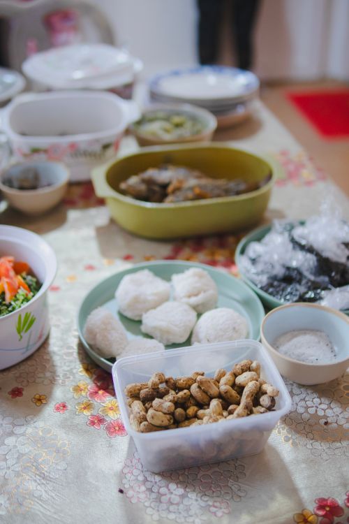 Free A variety of dishes elegantly arranged on a table, suitable for a festive gathering or celebration. Stock Photo