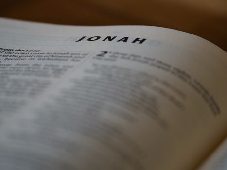 A close up of a bible with the word jonah