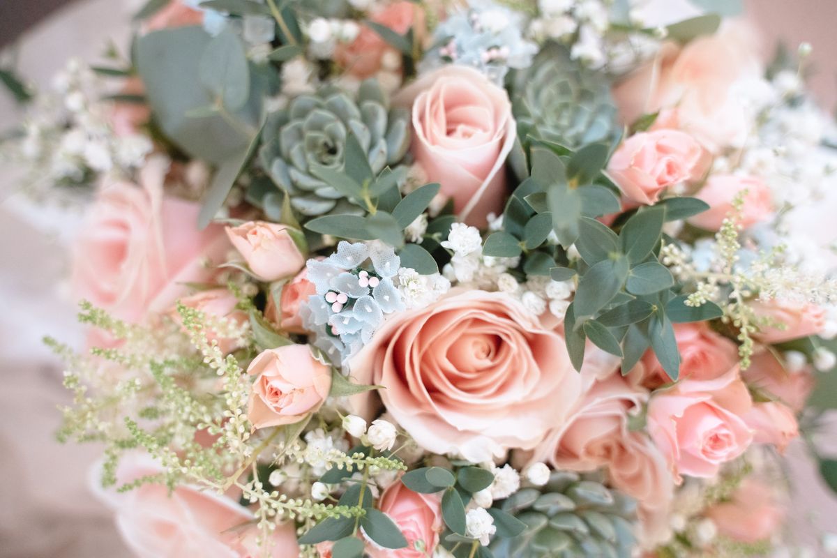 Pastel wedding bouquet designed by Bloom & Wild Florals for a Harleston Village celebration