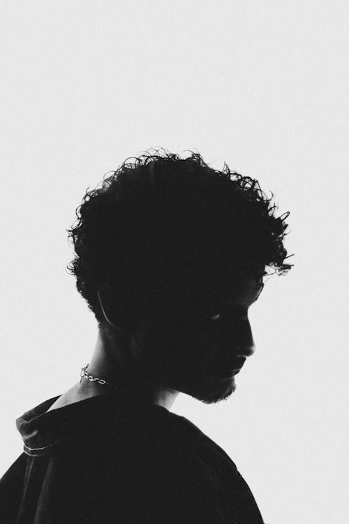 Man in Studio Looking over Shoulder