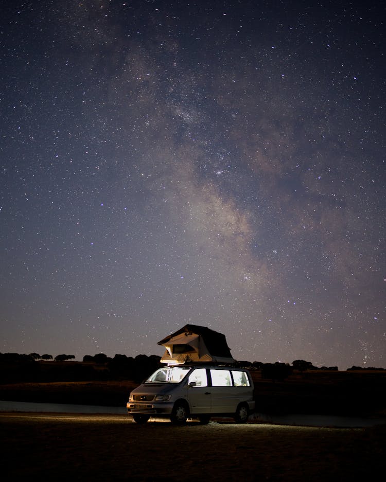 Van With Tent At Night