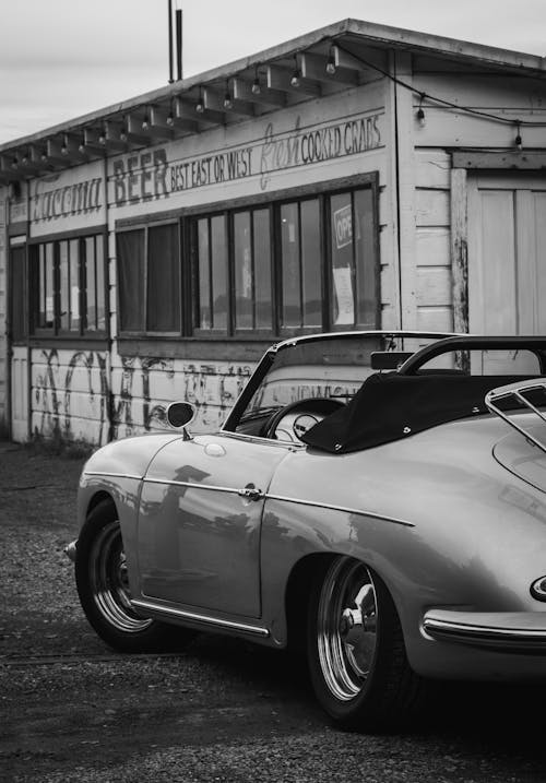 Free Vintage Car Parked Next To Building Stock Photo