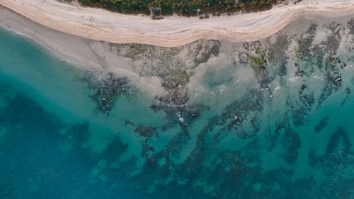 Drone Shot of a Coastline with Turquoise Water 