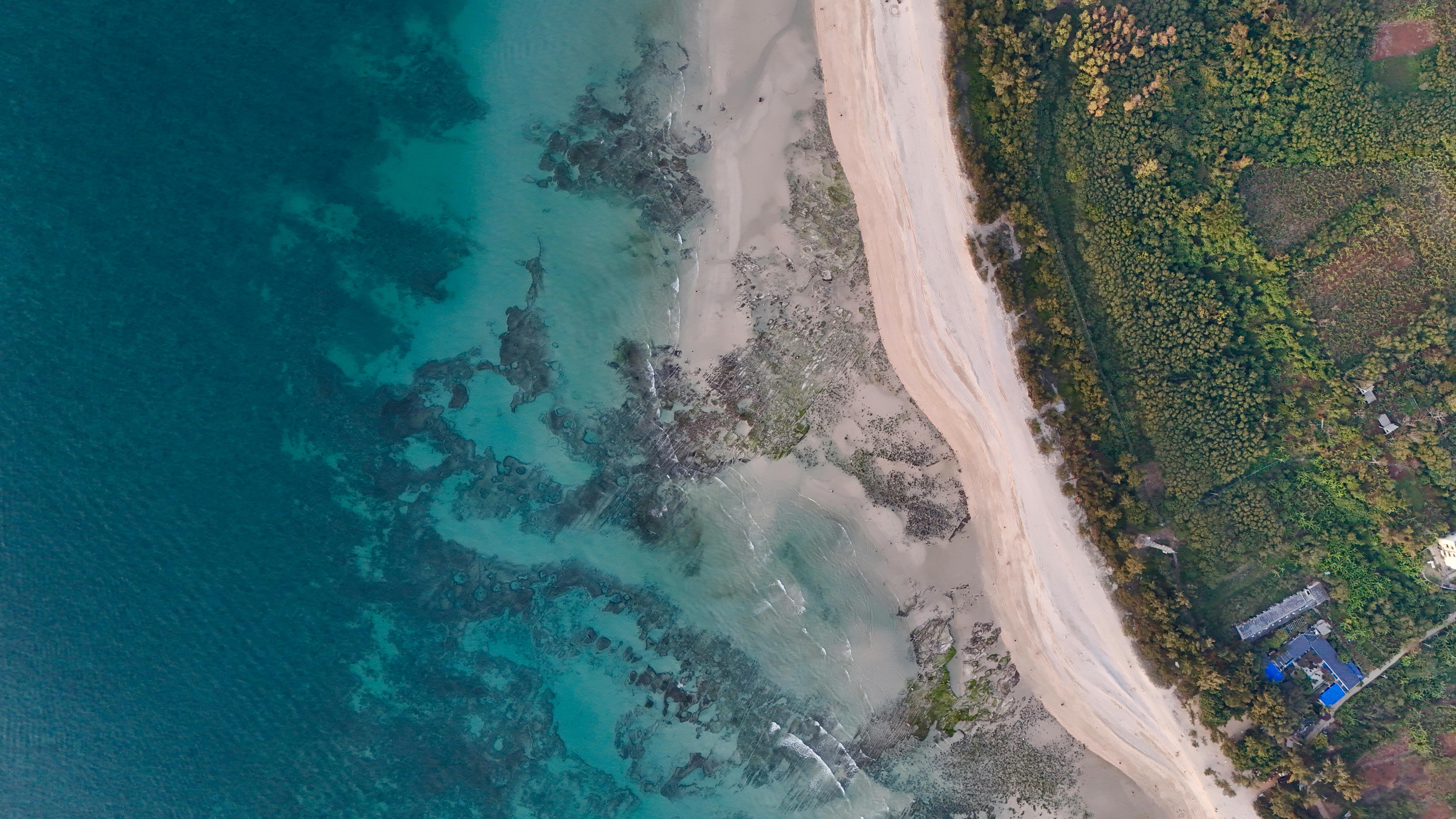 Coastal cliffs and beaches near Tutuala