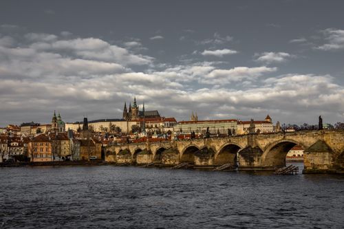 Free A panoramic view of the iconic Charles Bridge with Prague's skyline. Stock Photo