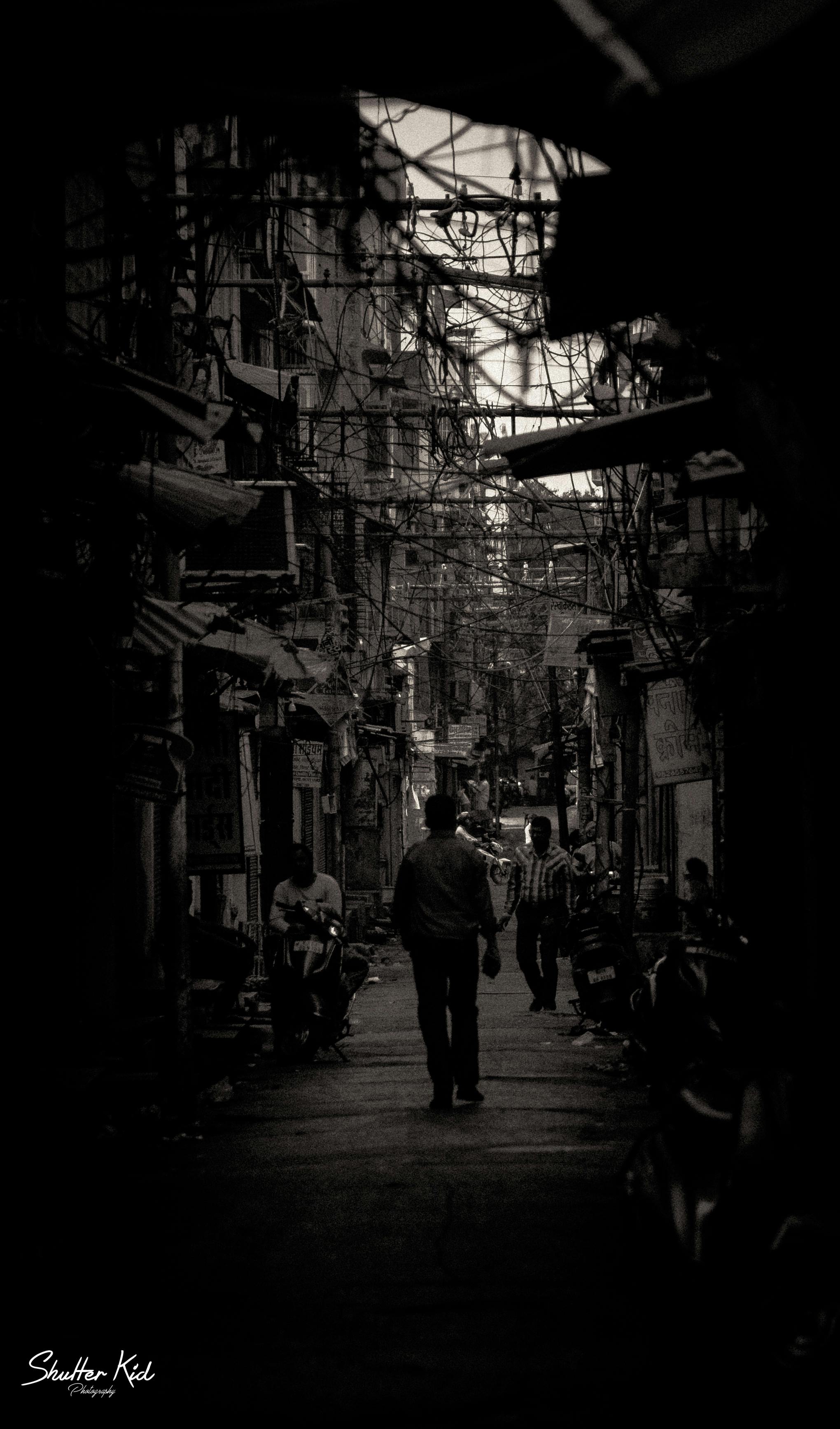 Free stock photo of black and white, man walking, street