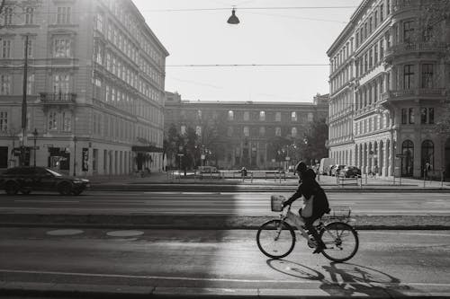 Person On a Bicycle Riding through the City