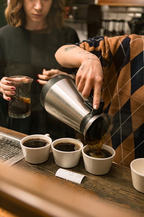 Pouring Coffee to Cups