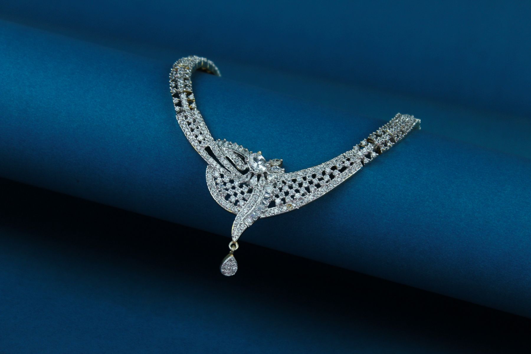 A diamond necklace on deep blue