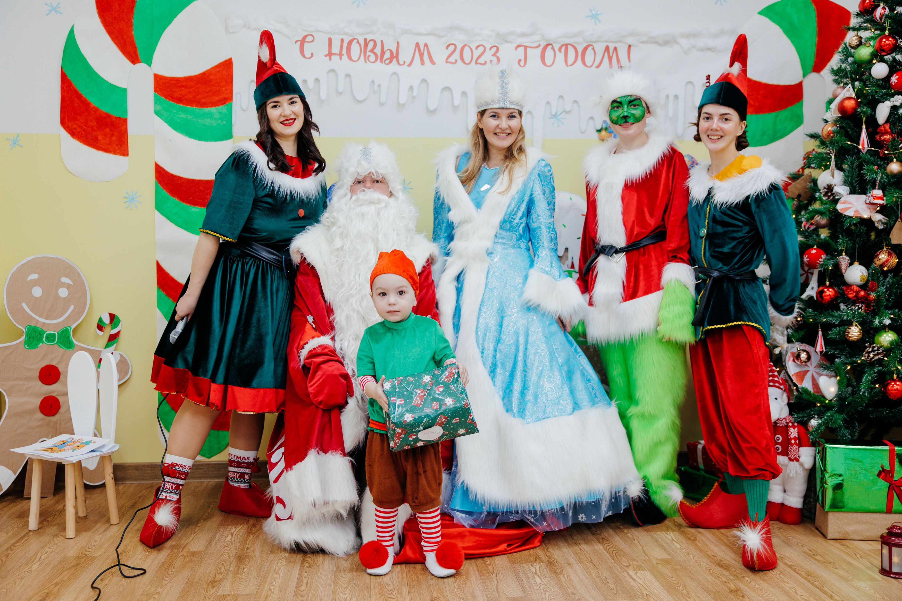 group christmas dress up Cue Camera Christmas Party Photo Fun!