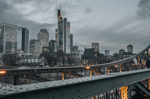 A city skyline with a bridge over it