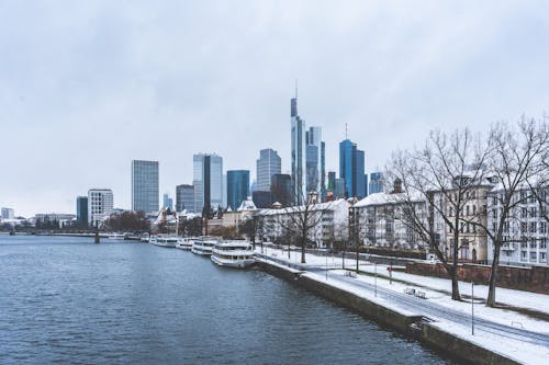 Frankfurt Skyscrapers behind River in Winter