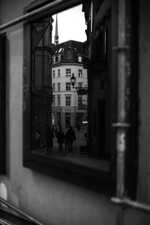 Free Reflective city scene capturing urban architecture in monochrome. Stock Photo