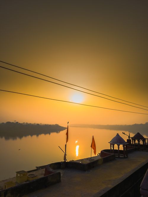 Free A temple near holly river with peacful nature and sunset view  Stock Photo