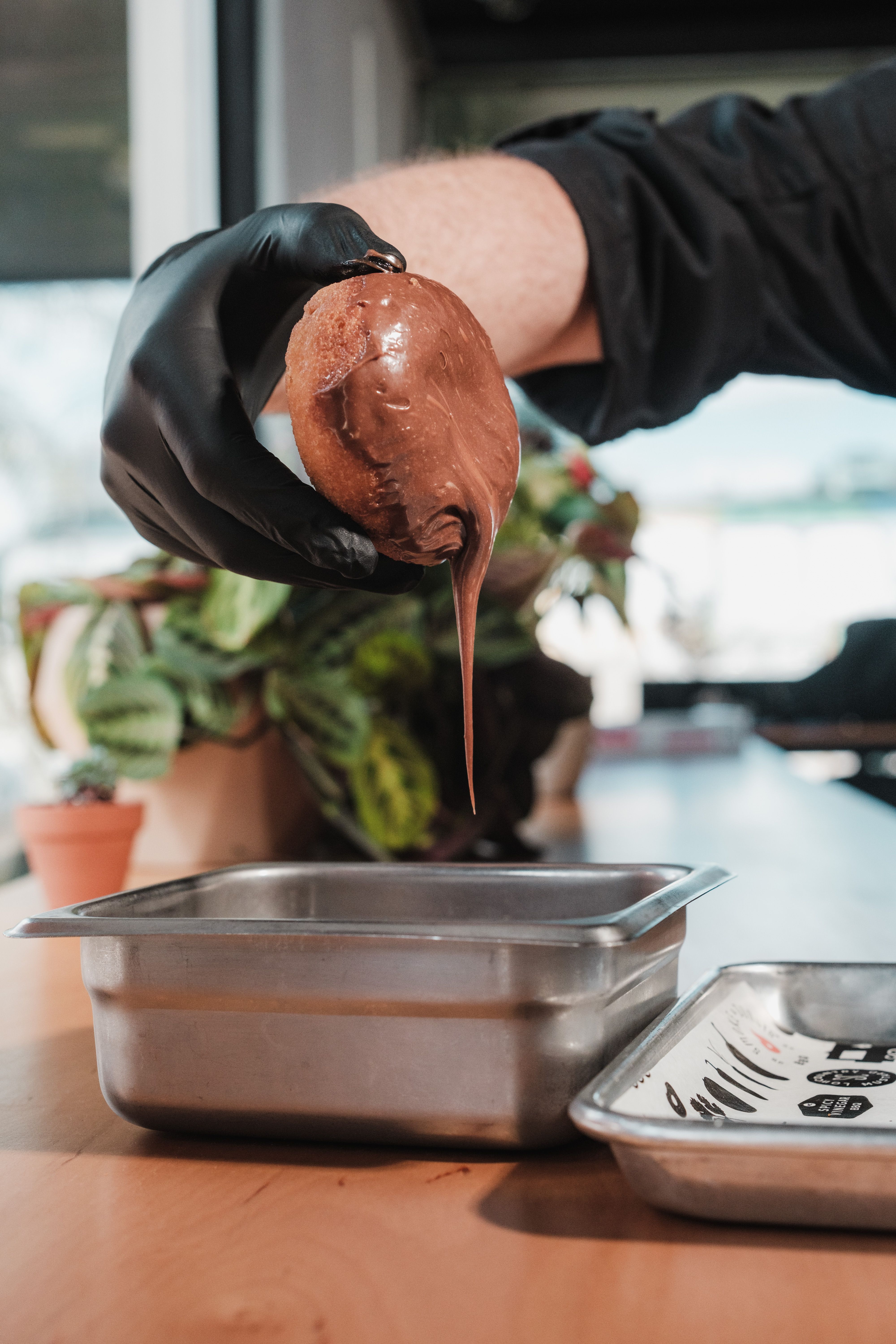 Man Hand in Glove Holding Meat · Free Stock Photo