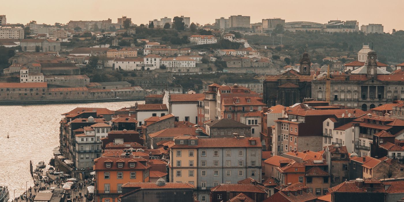 Panoramic view of Porto, Portugal with the Douro river and historic buildings