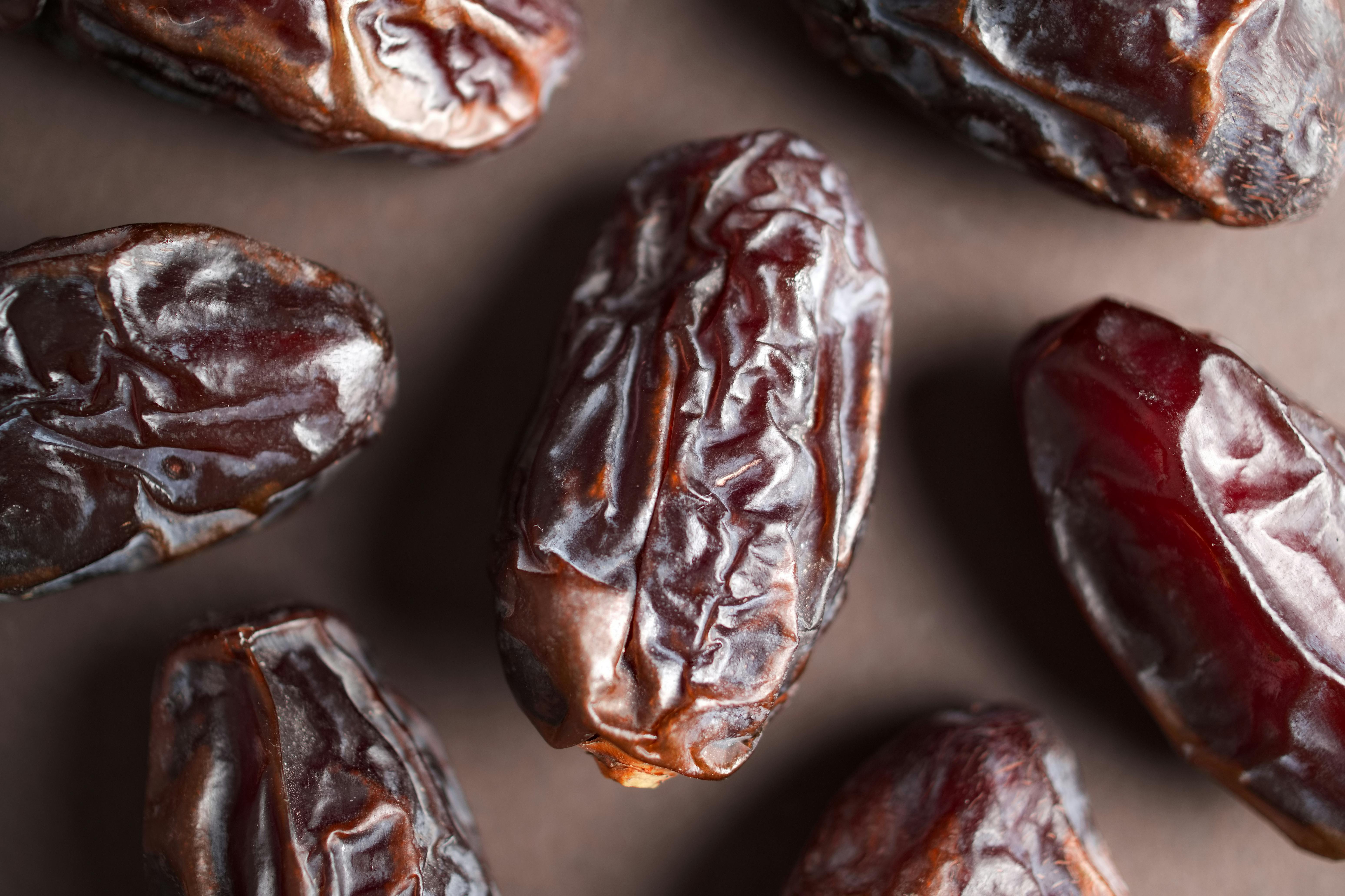 Fresh Medjool dates and dark roasted coffee beans - coffee date energy smoothie