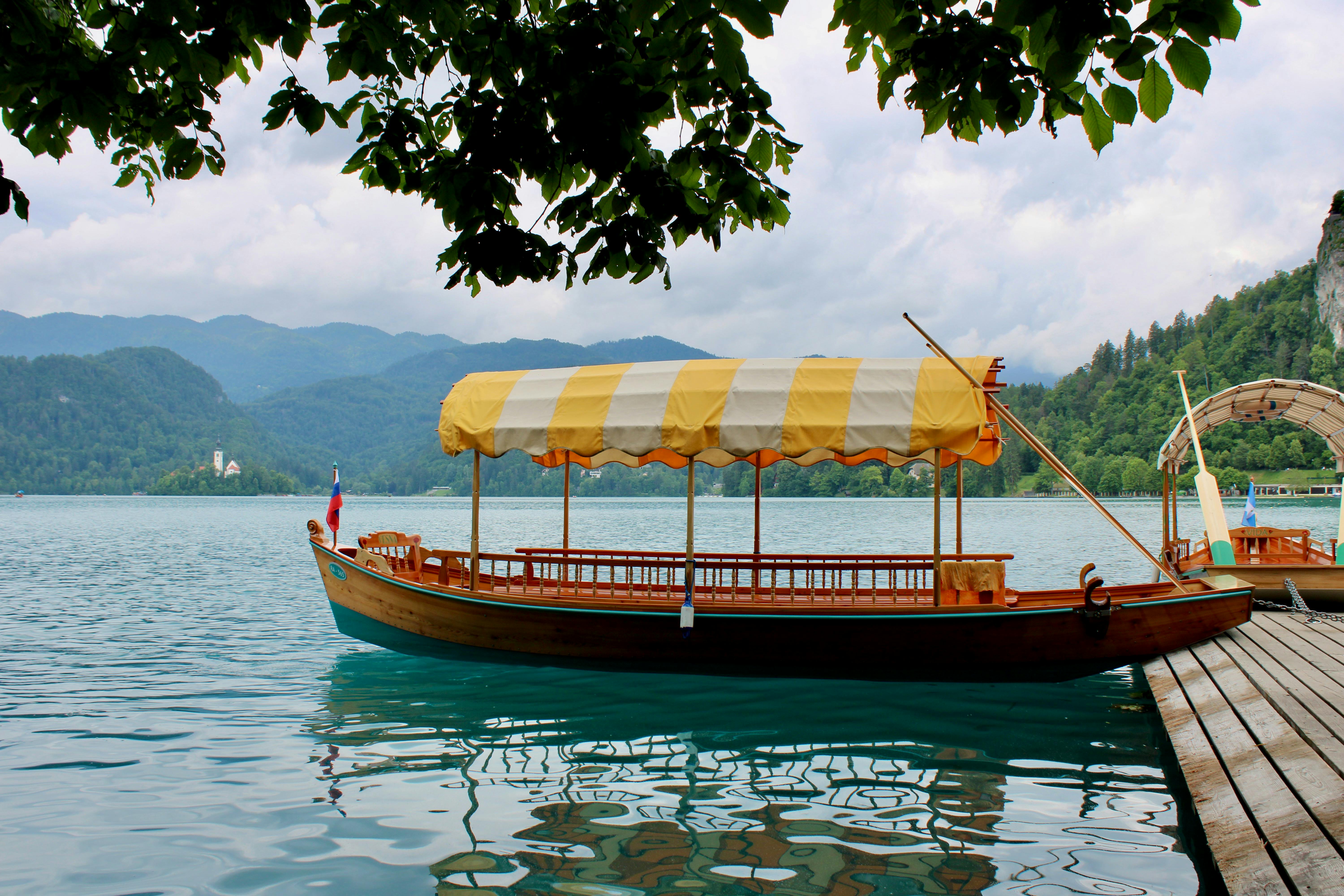 wooden boat on bled lake in slovenia