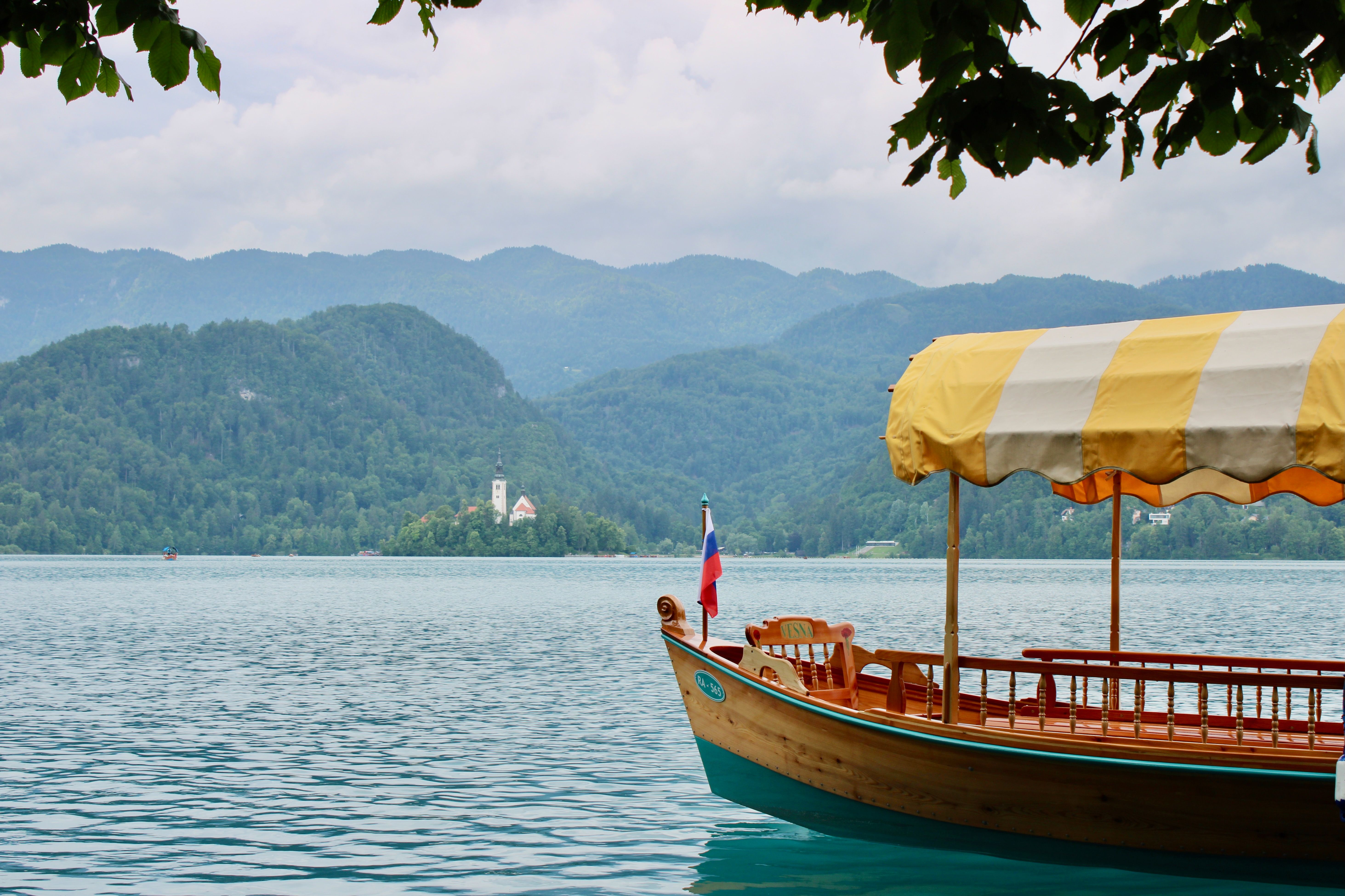Traditional pletna boat on Lake Bled Slovenia heading to Bled Island