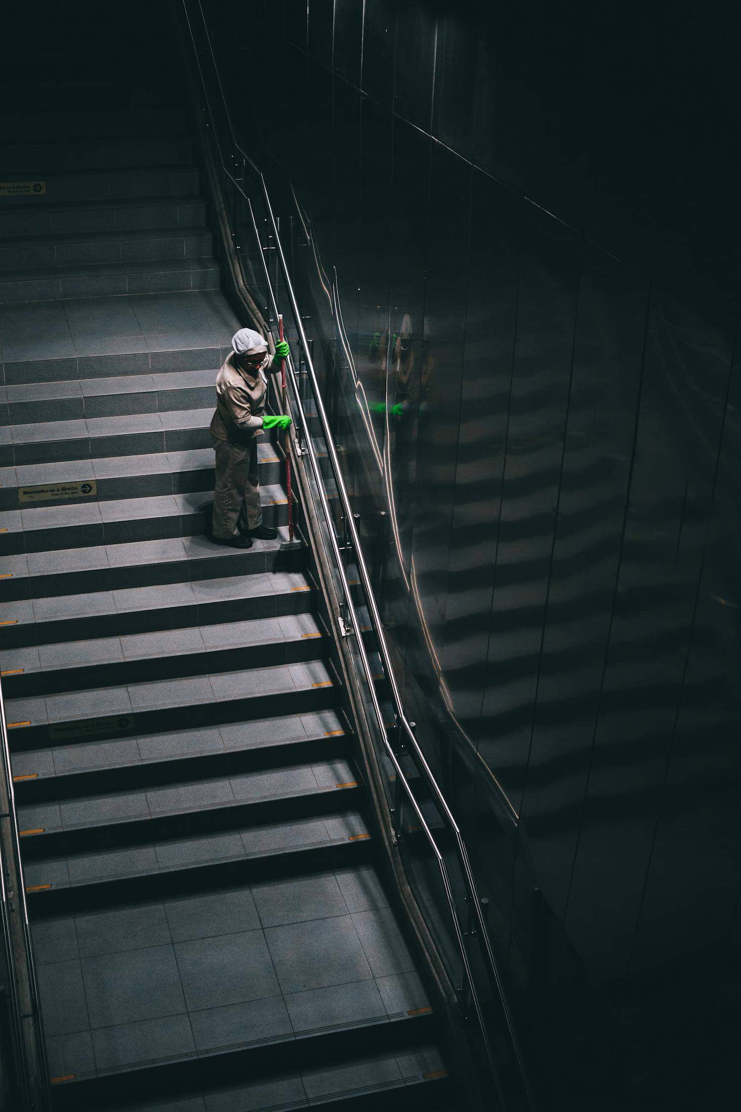 Person Standing on Stairs