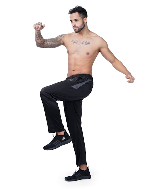 Fit Man Standing on One Leg