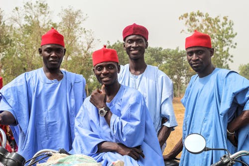 Group of Men in Traditional Clothes