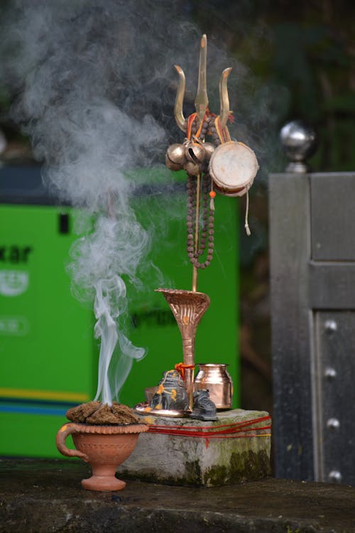 A small altar with a small statue of a god