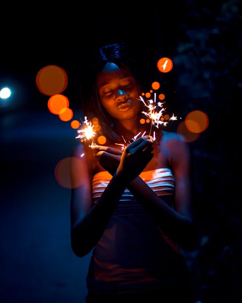 Free Photo of Woman Holding Sparklers Stock Photo