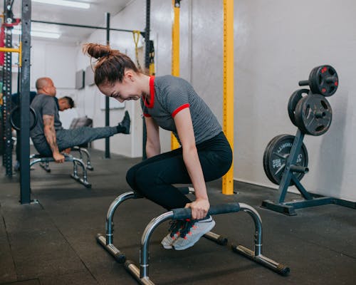 Women in the Gym Using the Exercise Equipment · Free Stock Photo