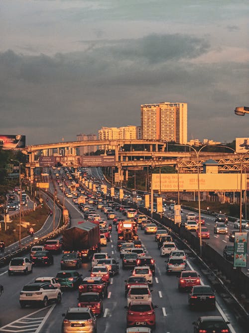 Traffic on the Highway in Kuala Lumpur at Sunset