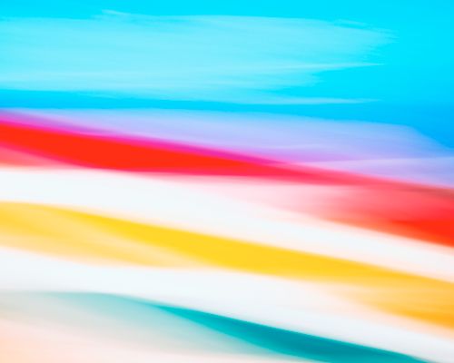 Free Bright abstract image with vibrant, colorful blurred lines creating a dynamic design. Stock Photo