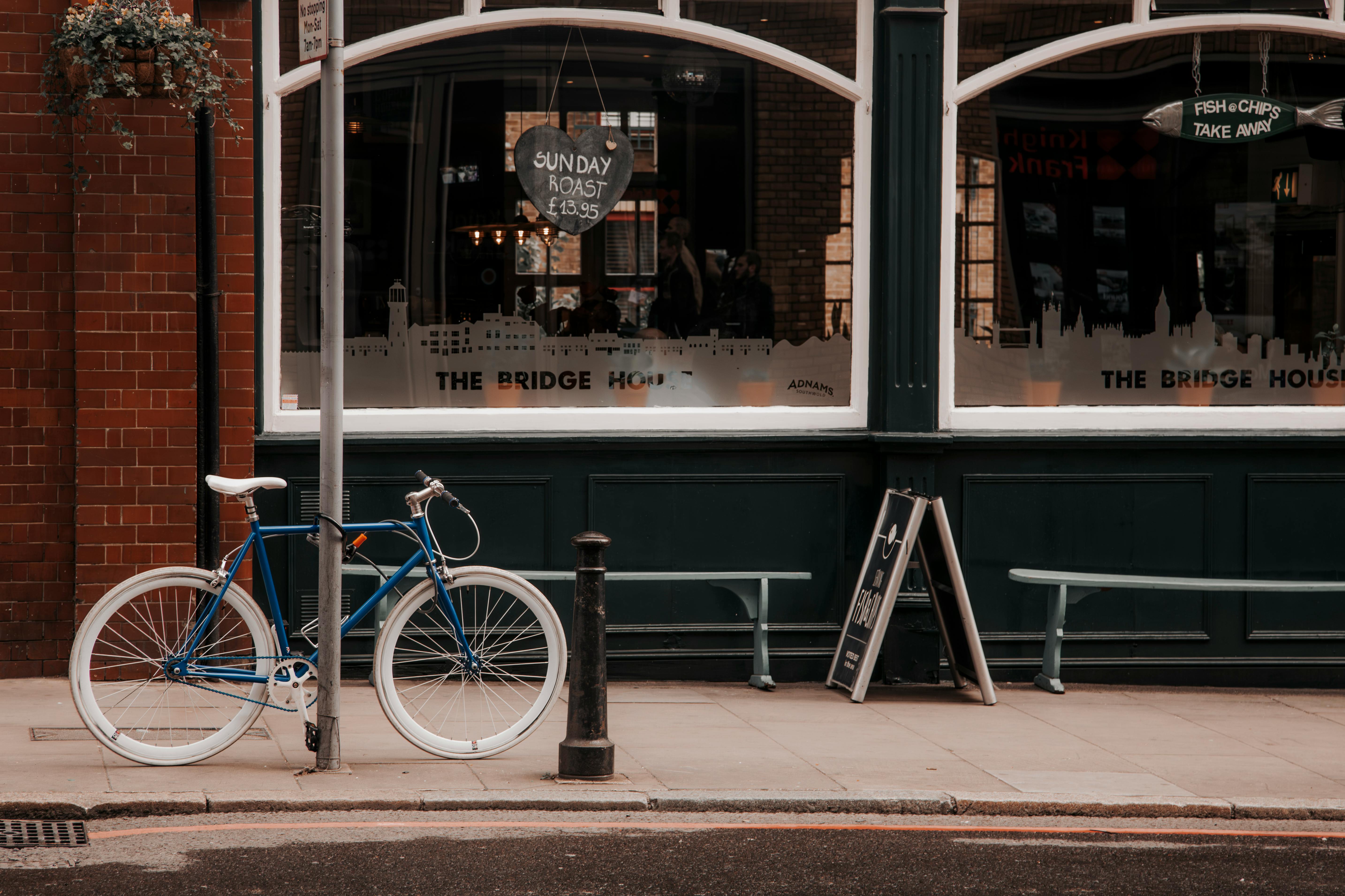 Man with Bike by the Stream · Free Stock Photo