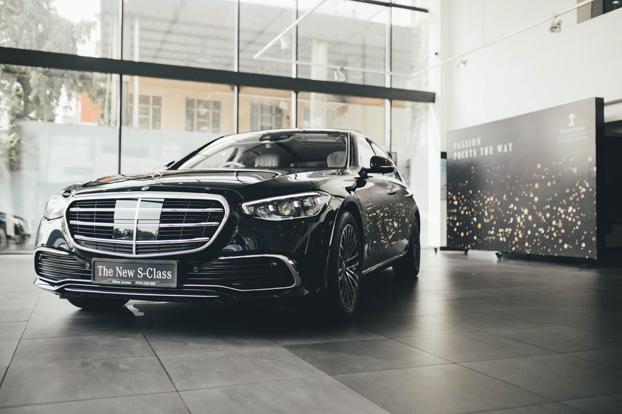 Black Mercedes-Benz S-Class in a bright showroom