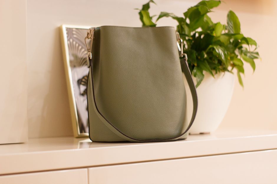 bag and notebook by the door cozy home lifestyle photo 1