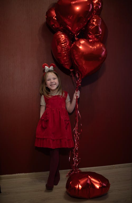 Gratis stockfoto met ballonnen, glimlachen, jurk
