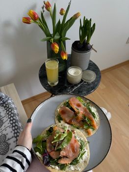 Enjoy a nutritious breakfast with smoked salmon tortillas and fresh juice at home.