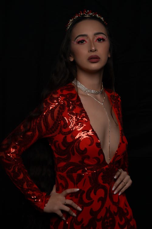 Woman Standing in Red Dress