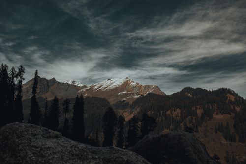Free Breathtaking view of the snow-capped Himalayas in Himachal Pradesh during twilight. Stock Photo